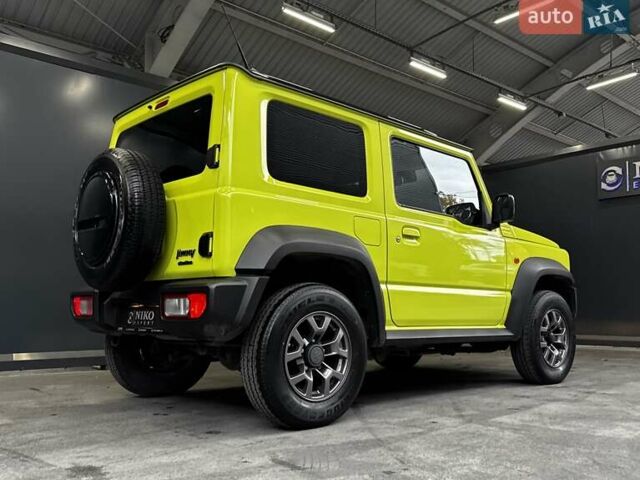 Желтый Сузуки Джимни, объемом двигателя 1.5 л и пробегом 149 тыс. км за 17900 $, фото 21 на Automoto.ua