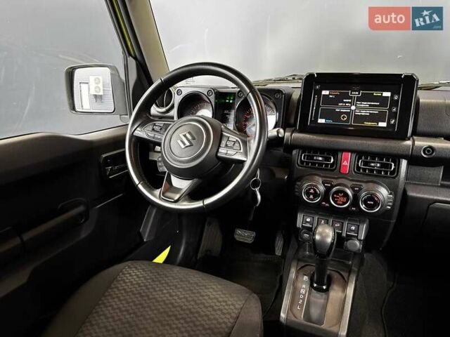 Желтый Сузуки Джимни, объемом двигателя 1.5 л и пробегом 149 тыс. км за 17900 $, фото 47 на Automoto.ua