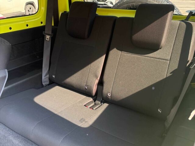 Желтый Сузуки Джимни, объемом двигателя 1.5 л и пробегом 28 тыс. км за 20450 $, фото 13 на Automoto.ua