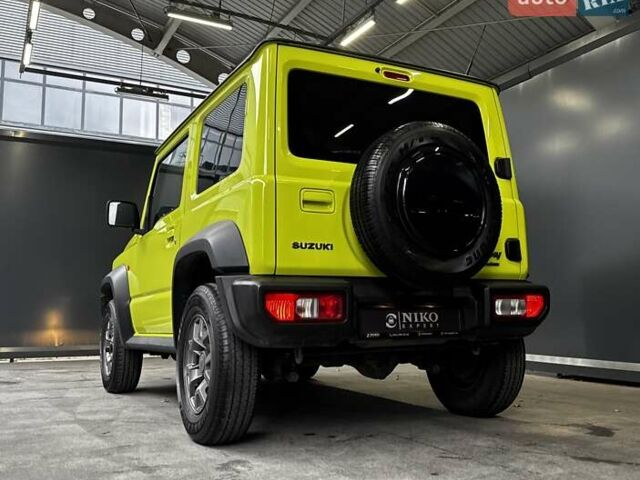 Желтый Сузуки Джимни, объемом двигателя 1.5 л и пробегом 149 тыс. км за 17900 $, фото 14 на Automoto.ua