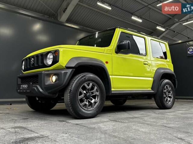 Желтый Сузуки Джимни, объемом двигателя 1.5 л и пробегом 149 тыс. км за 17900 $, фото 7 на Automoto.ua