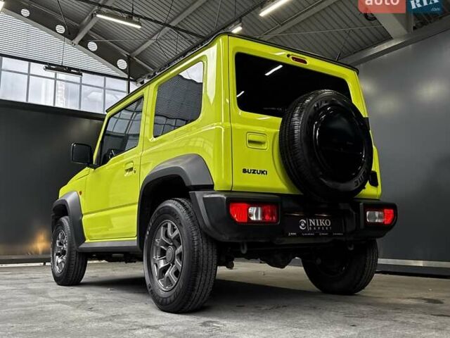 Желтый Сузуки Джимни, объемом двигателя 1.5 л и пробегом 149 тыс. км за 17900 $, фото 12 на Automoto.ua