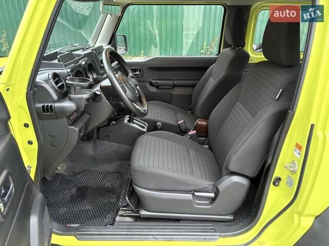 Желтый Сузуки Джимни, объемом двигателя 1.46 л и пробегом 62 тыс. км за 23300 $, фото 11 на Automoto.ua
