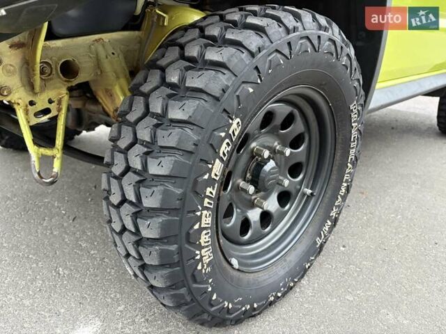 Желтый Сузуки Джимни, объемом двигателя 1.46 л и пробегом 62 тыс. км за 23300 $, фото 9 на Automoto.ua