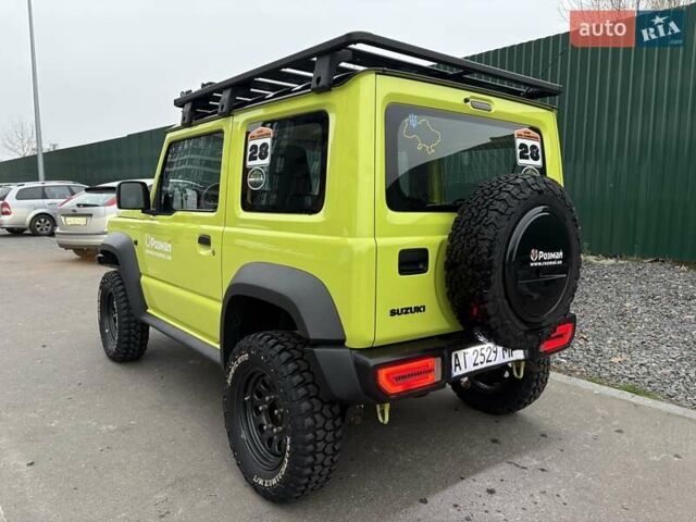 Желтый Сузуки Джимни, объемом двигателя 1.46 л и пробегом 62 тыс. км за 23300 $, фото 6 на Automoto.ua