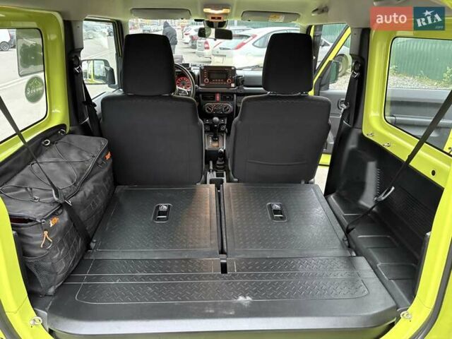 Желтый Сузуки Джимни, объемом двигателя 1.46 л и пробегом 62 тыс. км за 23300 $, фото 15 на Automoto.ua