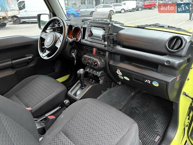 Желтый Сузуки Джимни, объемом двигателя 1.46 л и пробегом 62 тыс. км за 23300 $, фото 14 на Automoto.ua