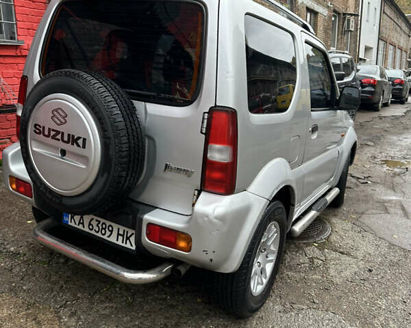 Серый Сузуки Джимни, объемом двигателя 1.3 л и пробегом 164 тыс. км за 7800 $, фото 2 на Automoto.ua
