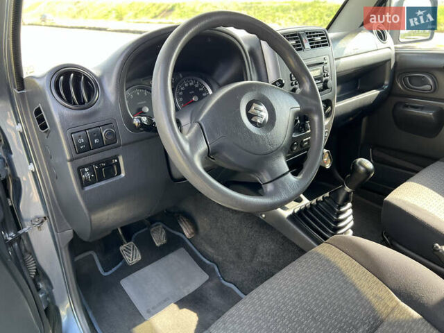 Сірий Сузукі Джімні, об'ємом двигуна 1.3 л та пробігом 195 тис. км за 8500 $, фото 19 на Automoto.ua
