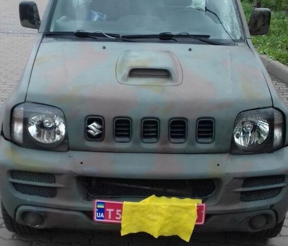 Сірий Сузукі Джімні, об'ємом двигуна 1.5 л та пробігом 249 тис. км за 6000 $, фото 1 на Automoto.ua