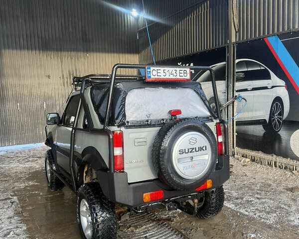 Сірий Сузукі Джімні, об'ємом двигуна 1.46 л та пробігом 117 тис. км за 12000 $, фото 6 на Automoto.ua