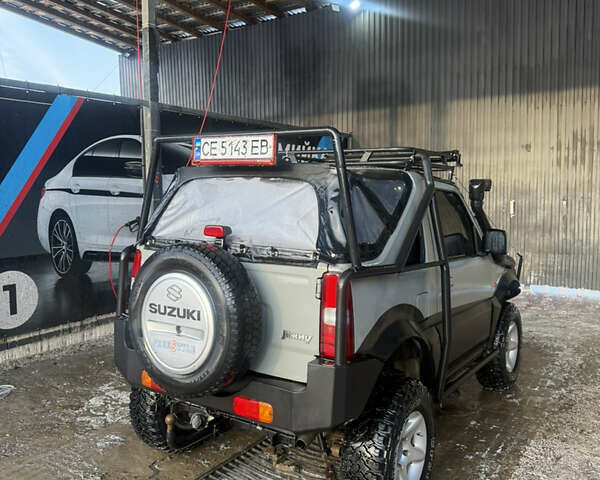 Сірий Сузукі Джімні, об'ємом двигуна 1.46 л та пробігом 117 тис. км за 12000 $, фото 4 на Automoto.ua