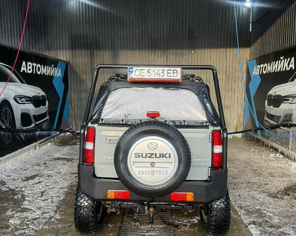 Сірий Сузукі Джімні, об'ємом двигуна 1.46 л та пробігом 117 тис. км за 12000 $, фото 5 на Automoto.ua