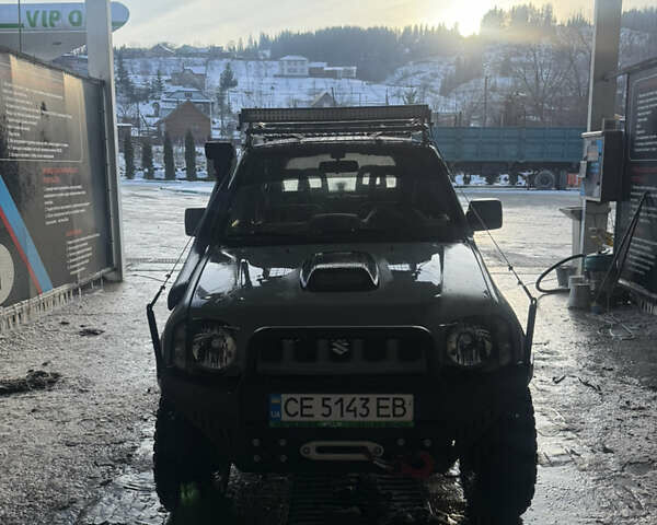 Сірий Сузукі Джімні, об'ємом двигуна 1.46 л та пробігом 117 тис. км за 13000 $, фото 1 на Automoto.ua