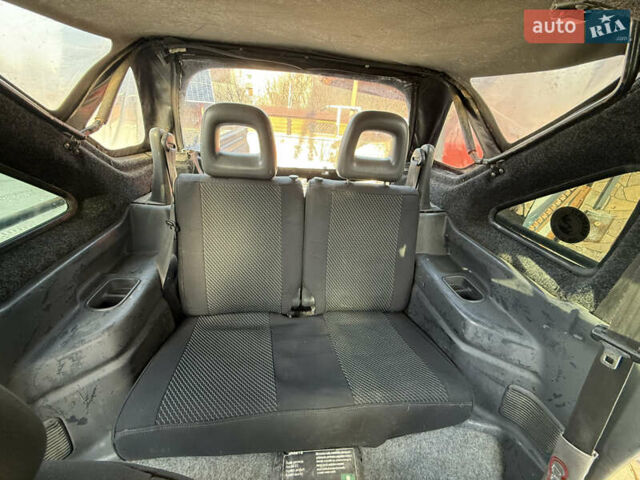 Сірий Сузукі Джімні, об'ємом двигуна 1.46 л та пробігом 117 тис. км за 12000 $, фото 14 на Automoto.ua