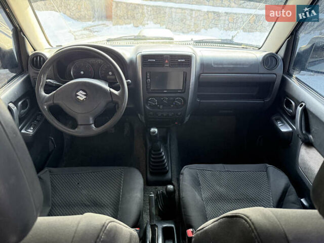 Сірий Сузукі Джімні, об'ємом двигуна 1.46 л та пробігом 117 тис. км за 12000 $, фото 12 на Automoto.ua