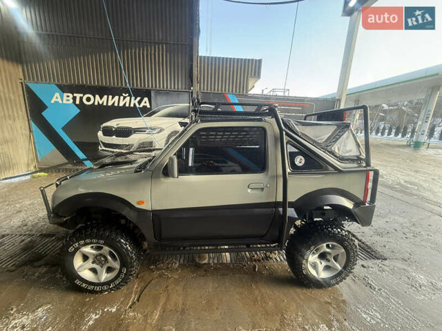 Сірий Сузукі Джімні, об'ємом двигуна 1.46 л та пробігом 117 тис. км за 12000 $, фото 8 на Automoto.ua