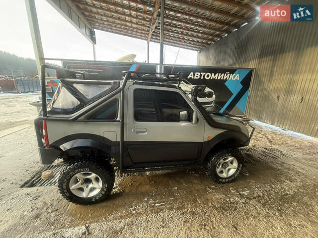Сірий Сузукі Джімні, об'ємом двигуна 1.46 л та пробігом 117 тис. км за 12000 $, фото 3 на Automoto.ua