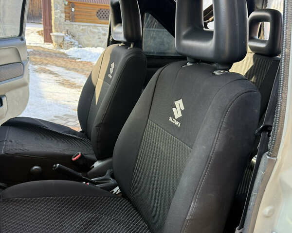 Сірий Сузукі Джімні, об'ємом двигуна 1.46 л та пробігом 117 тис. км за 13000 $, фото 10 на Automoto.ua