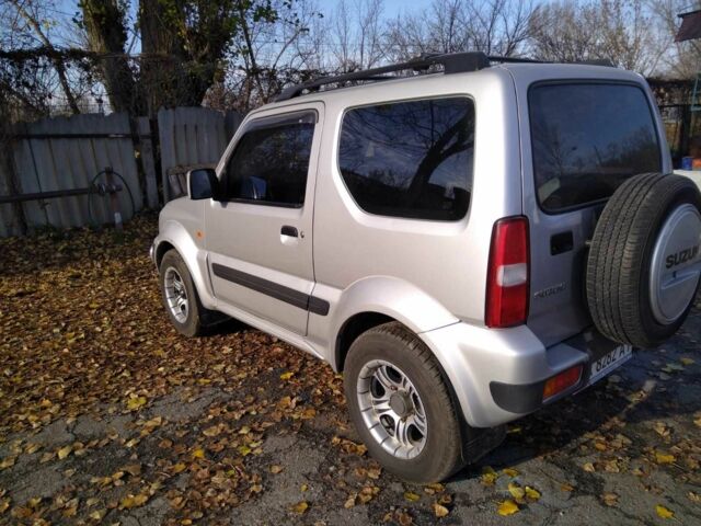 Серый Сузуки Джимни, объемом двигателя 1.3 л и пробегом 73 тыс. км за 274 $, фото 2 на Automoto.ua