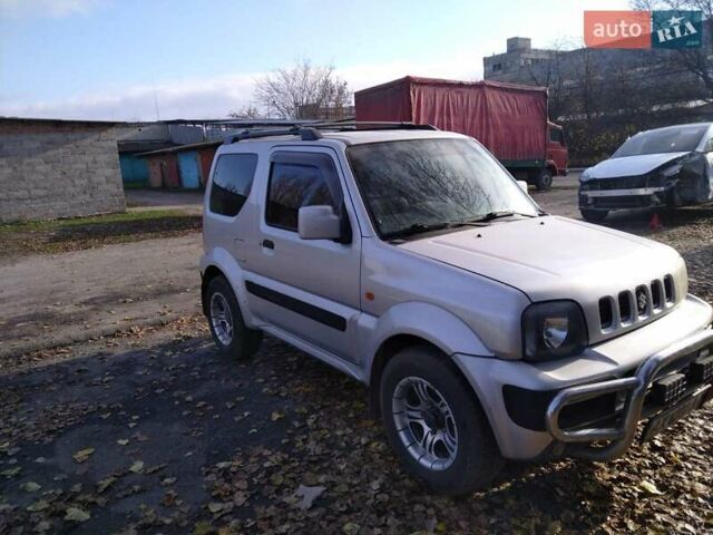 Серый Сузуки Джимни, объемом двигателя 1.3 л и пробегом 73 тыс. км за 11500 $, фото 6 на Automoto.ua