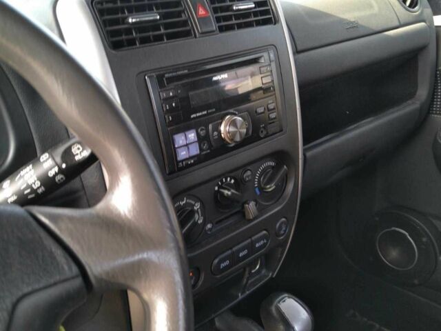 Серый Сузуки Джимни, объемом двигателя 1.3 л и пробегом 73 тыс. км за 274 $, фото 5 на Automoto.ua