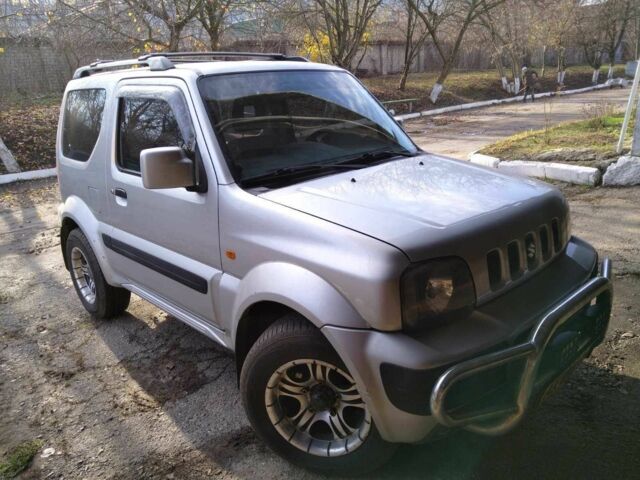 Серый Сузуки Джимни, объемом двигателя 1.3 л и пробегом 73 тыс. км за 274 $, фото 6 на Automoto.ua