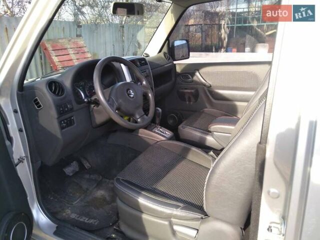 Серый Сузуки Джимни, объемом двигателя 1.3 л и пробегом 73 тыс. км за 11500 $, фото 5 на Automoto.ua