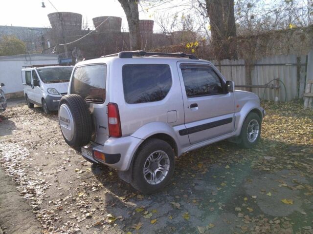 Серый Сузуки Джимни, объемом двигателя 1.3 л и пробегом 73 тыс. км за 274 $, фото 1 на Automoto.ua