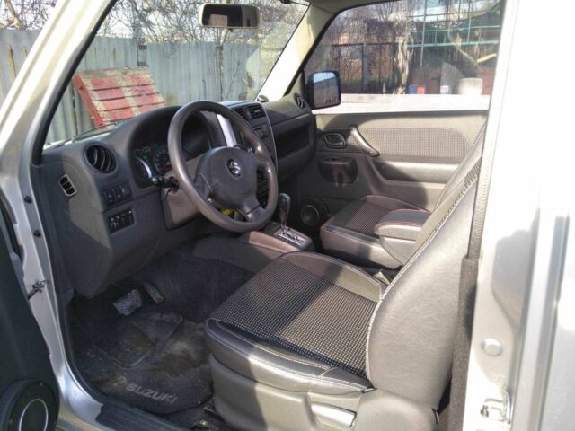 Серый Сузуки Джимни, объемом двигателя 1.3 л и пробегом 73 тыс. км за 274 $, фото 3 на Automoto.ua