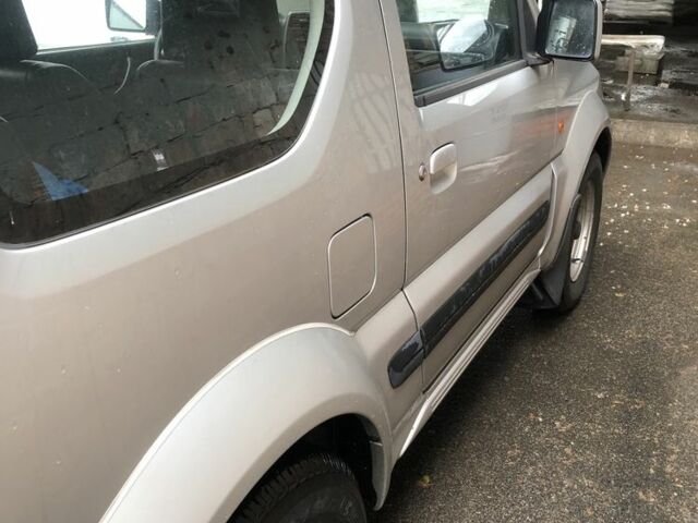 Сірий Сузукі Джімні, об'ємом двигуна 1.3 л та пробігом 83 тис. км за 11000 $, фото 6 на Automoto.ua