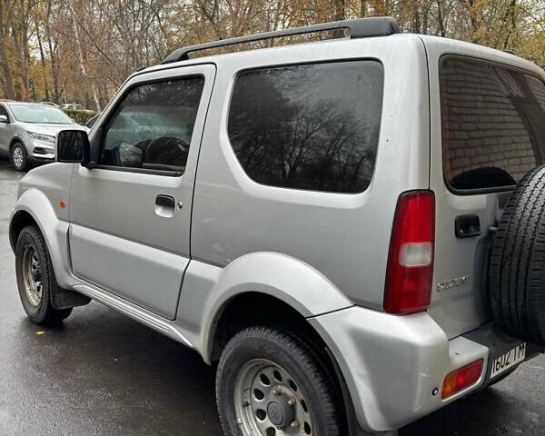 Серый Сузуки Джимни, объемом двигателя 1.33 л и пробегом 121 тыс. км за 8800 $, фото 5 на Automoto.ua