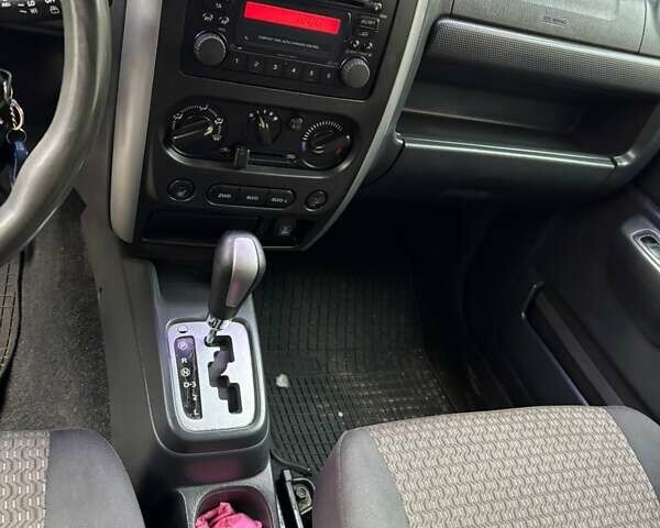 Серый Сузуки Джимни, объемом двигателя 1.33 л и пробегом 121 тыс. км за 8800 $, фото 1 на Automoto.ua