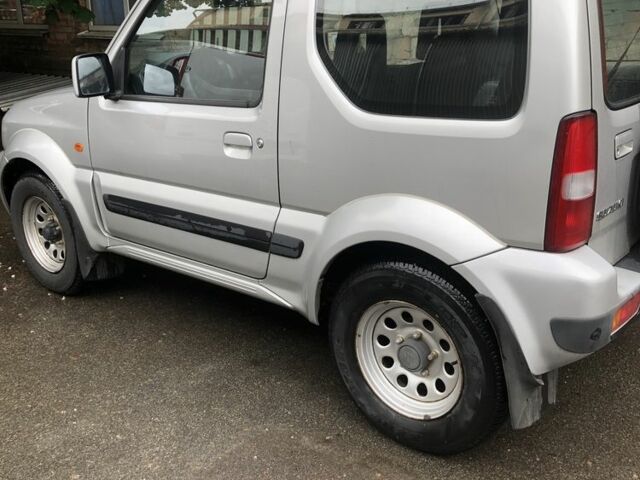 Сірий Сузукі Джімні, об'ємом двигуна 1.3 л та пробігом 83 тис. км за 11000 $, фото 3 на Automoto.ua