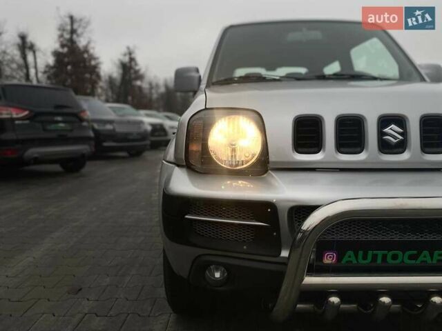 Серый Сузуки Джимни, объемом двигателя 1.33 л и пробегом 83 тыс. км за 11490 $, фото 7 на Automoto.ua