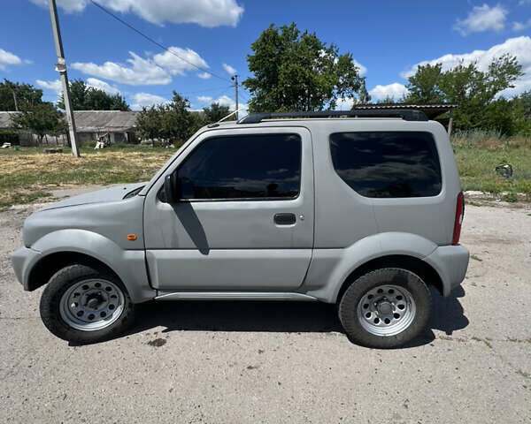 Сірий Сузукі Джімні, об'ємом двигуна 1.3 л та пробігом 140 тис. км за 7000 $, фото 2 на Automoto.ua