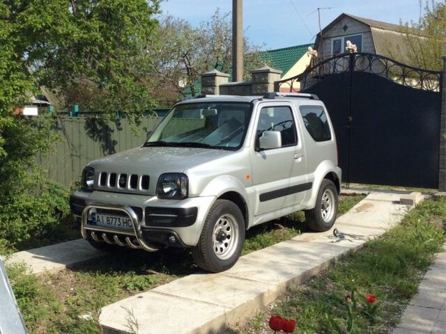Сірий Сузукі Джімні, об'ємом двигуна 1.3 л та пробігом 83 тис. км за 11000 $, фото 7 на Automoto.ua