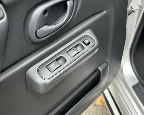 Сузукі Джімні 2013 у Харкові на Automoto.ua Сірий Сузукі Джімні, об'ємом двигуна 1.4 л та пробігом 38 тис. км за 10500 $, фото 14 на Automoto.ua