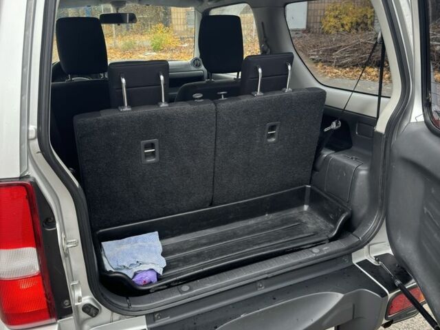 Серый Сузуки Джимни, объемом двигателя 1.3 л и пробегом 38 тыс. км за 10500 $, фото 19 на Automoto.ua