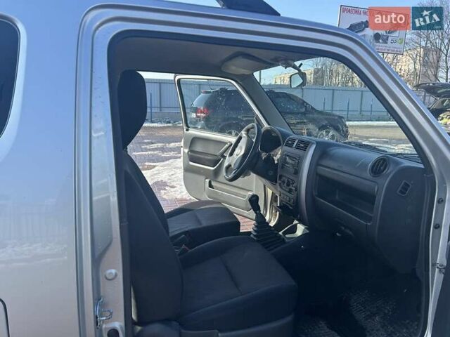Серый Сузуки Джимни, объемом двигателя 1.33 л и пробегом 90 тыс. км за 11700 $, фото 7 на Automoto.ua