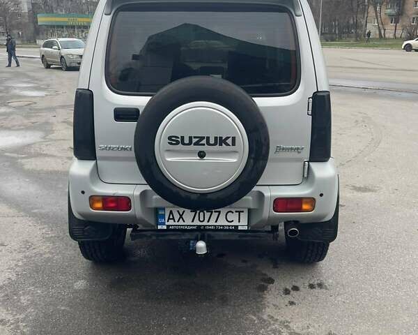 Серый Сузуки Джимни, объемом двигателя 1.3 л и пробегом 68 тыс. км за 16900 $, фото 4 на Automoto.ua