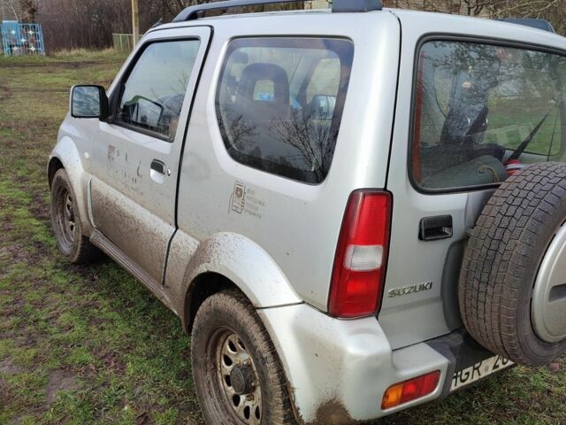 Сірий Сузукі Джімні, об'ємом двигуна 1.3 л та пробігом 124 тис. км за 3071 $, фото 5 на Automoto.ua