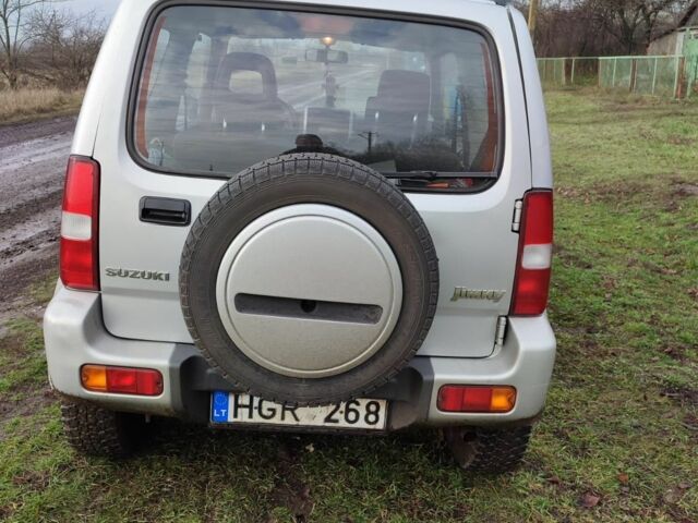 Сірий Сузукі Джімні, об'ємом двигуна 1.3 л та пробігом 124 тис. км за 3071 $, фото 2 на Automoto.ua