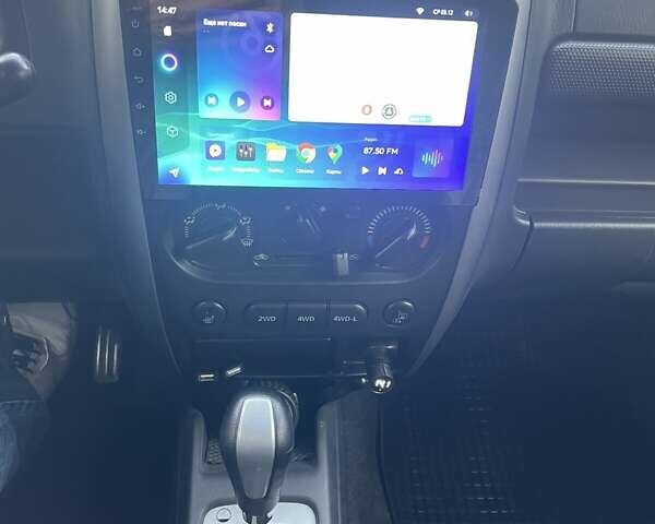 Серый Сузуки Джимни, объемом двигателя 1.3 л и пробегом 68 тыс. км за 16900 $, фото 14 на Automoto.ua