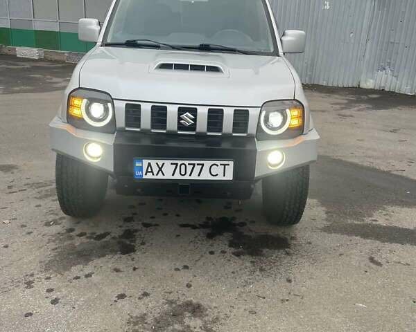 Серый Сузуки Джимни, объемом двигателя 1.3 л и пробегом 68 тыс. км за 16900 $, фото 3 на Automoto.ua