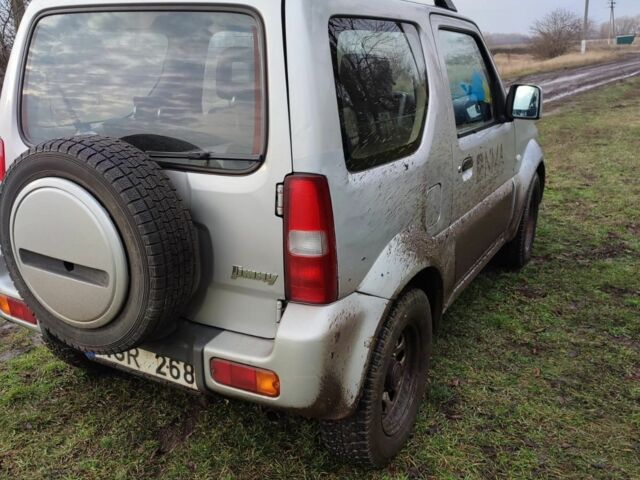 Сірий Сузукі Джімні, об'ємом двигуна 1.3 л та пробігом 124 тис. км за 3071 $, фото 6 на Automoto.ua