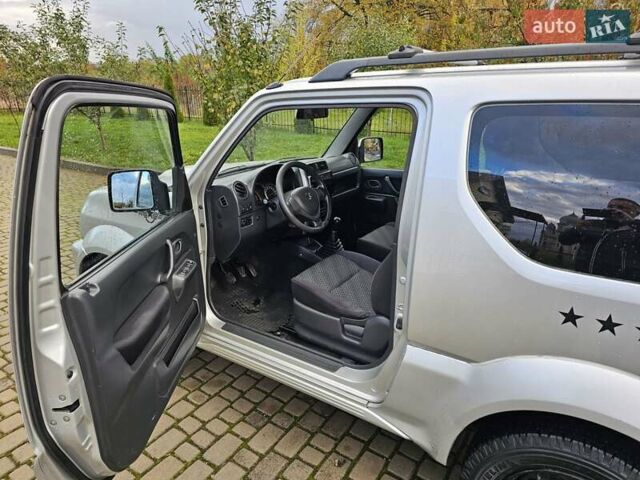 Серый Сузуки Джимни, объемом двигателя 1.33 л и пробегом 149 тыс. км за 11700 $, фото 4 на Automoto.ua