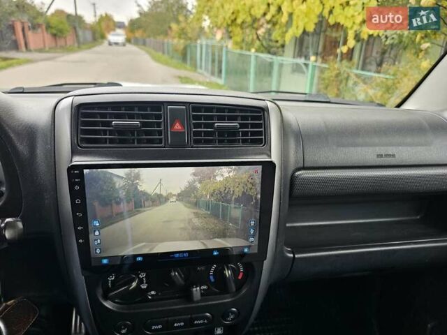 Серый Сузуки Джимни, объемом двигателя 1.33 л и пробегом 149 тыс. км за 11700 $, фото 16 на Automoto.ua