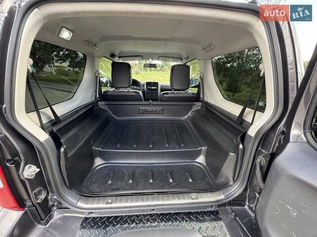 Сірий Сузукі Джімні, об'ємом двигуна 1.3 л та пробігом 43 тис. км за 16500 $, фото 9 на Automoto.ua