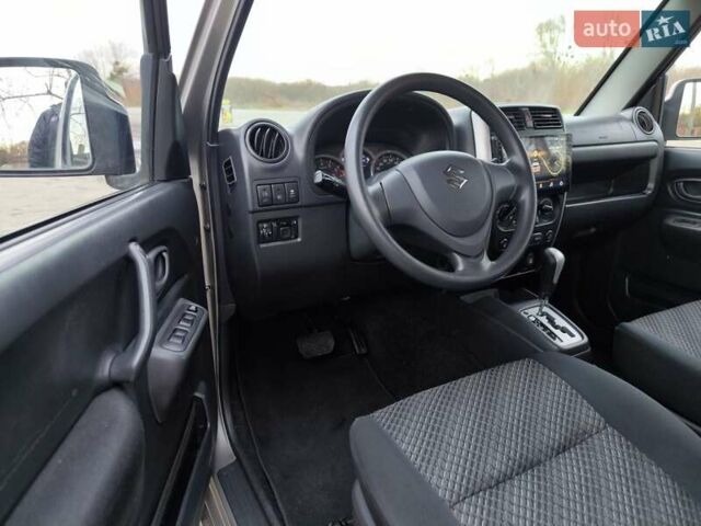 Серый Сузуки Джимни, объемом двигателя 1.33 л и пробегом 92 тыс. км за 13999 $, фото 3 на Automoto.ua